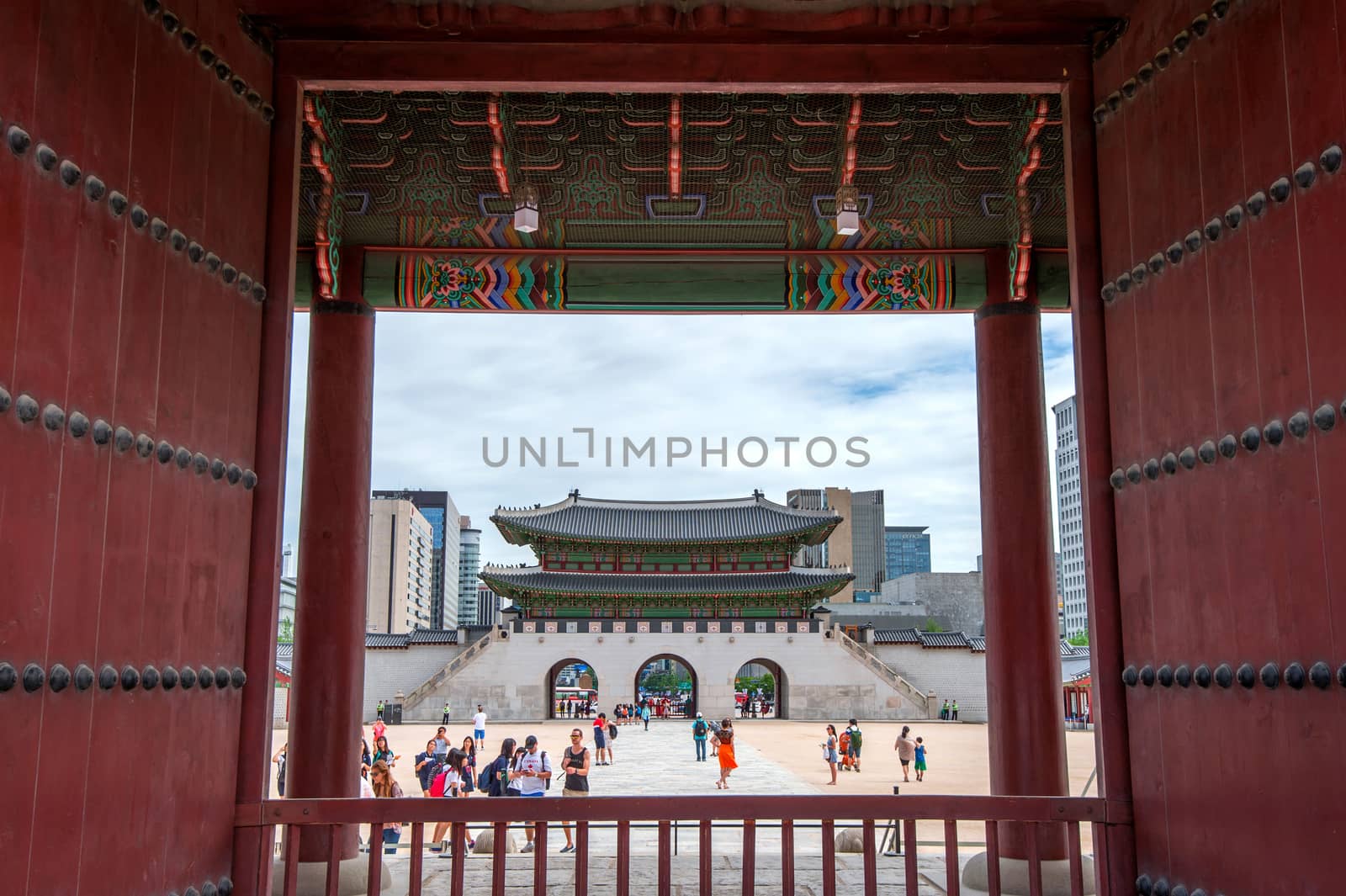 SEOUL, SOUTH KOREA - JULY 17: Tourists taking photos of the beautiful scenery around Gyeongbokgung Palace on July 17, 2015 in Seoul, South Korea.