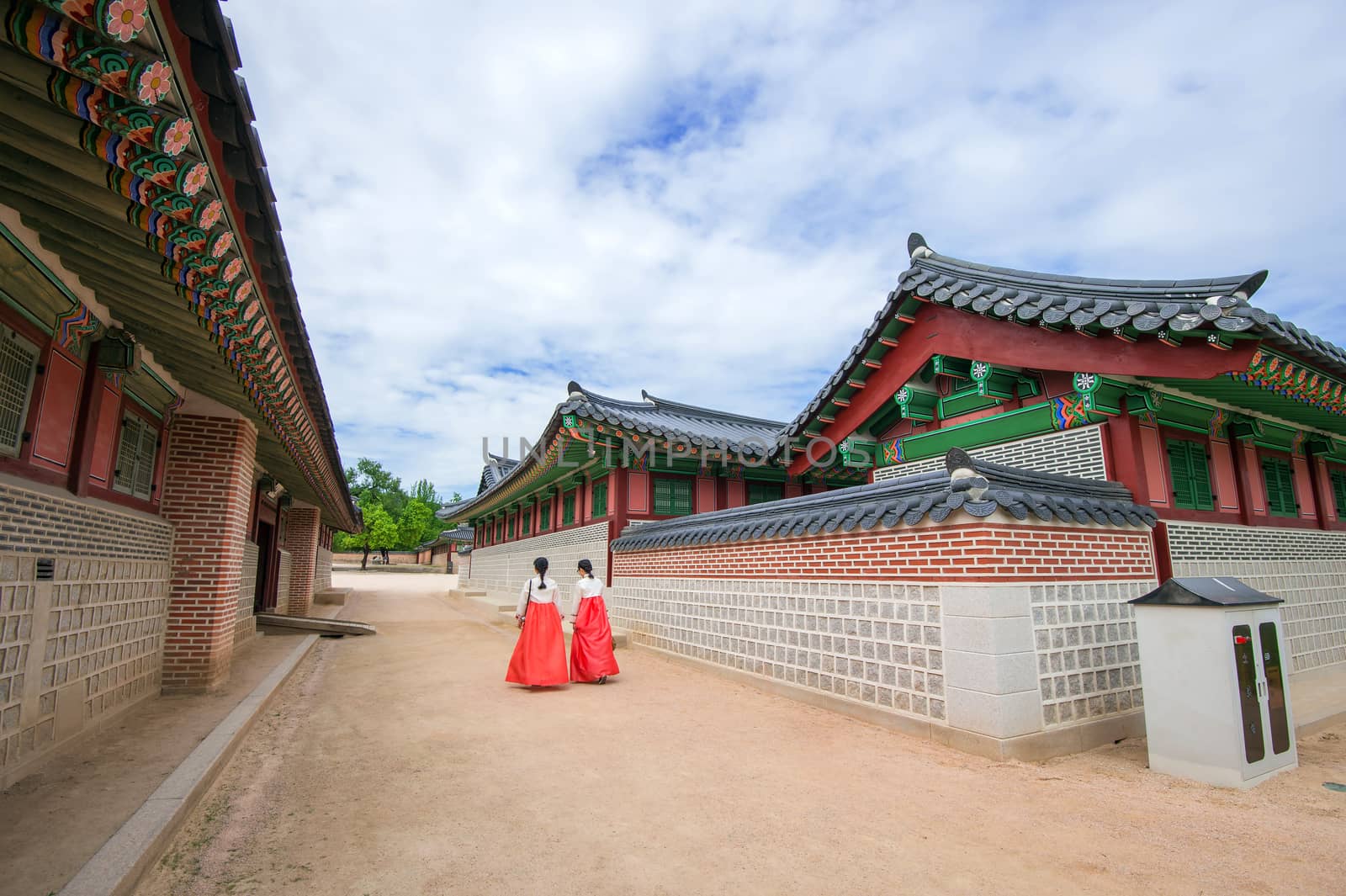 Tourists taking photos of the beautiful scenery around Gyeongbokgung Palace. by gutarphotoghaphy