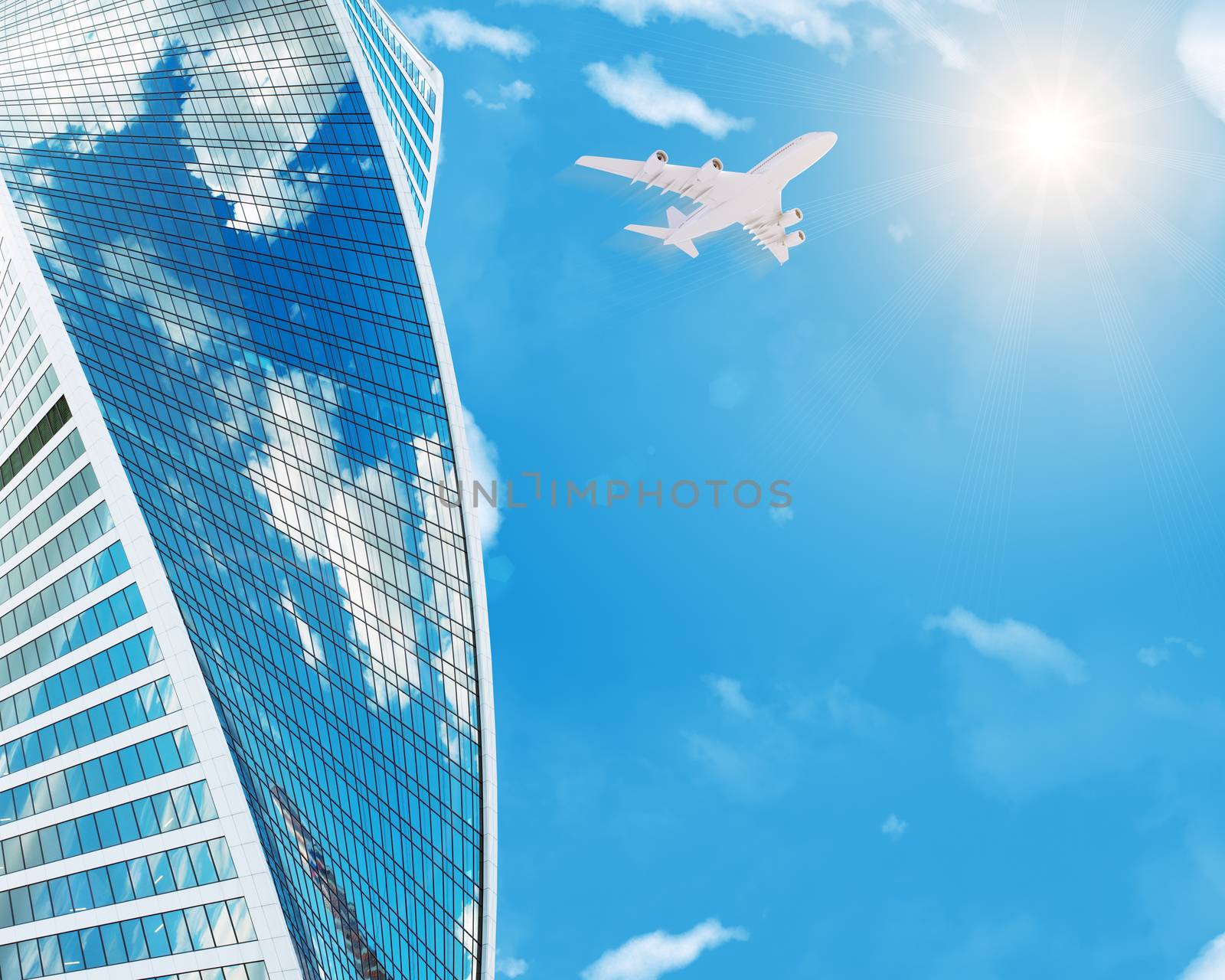 Skyscraper with jet in sky with sun and clouds, business concept