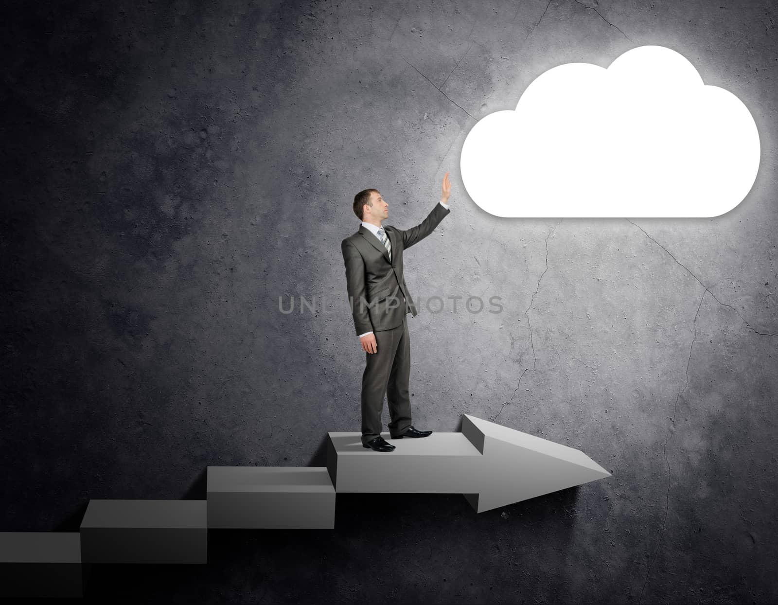 Businessman touching cloud sign standing on stairs, business concept