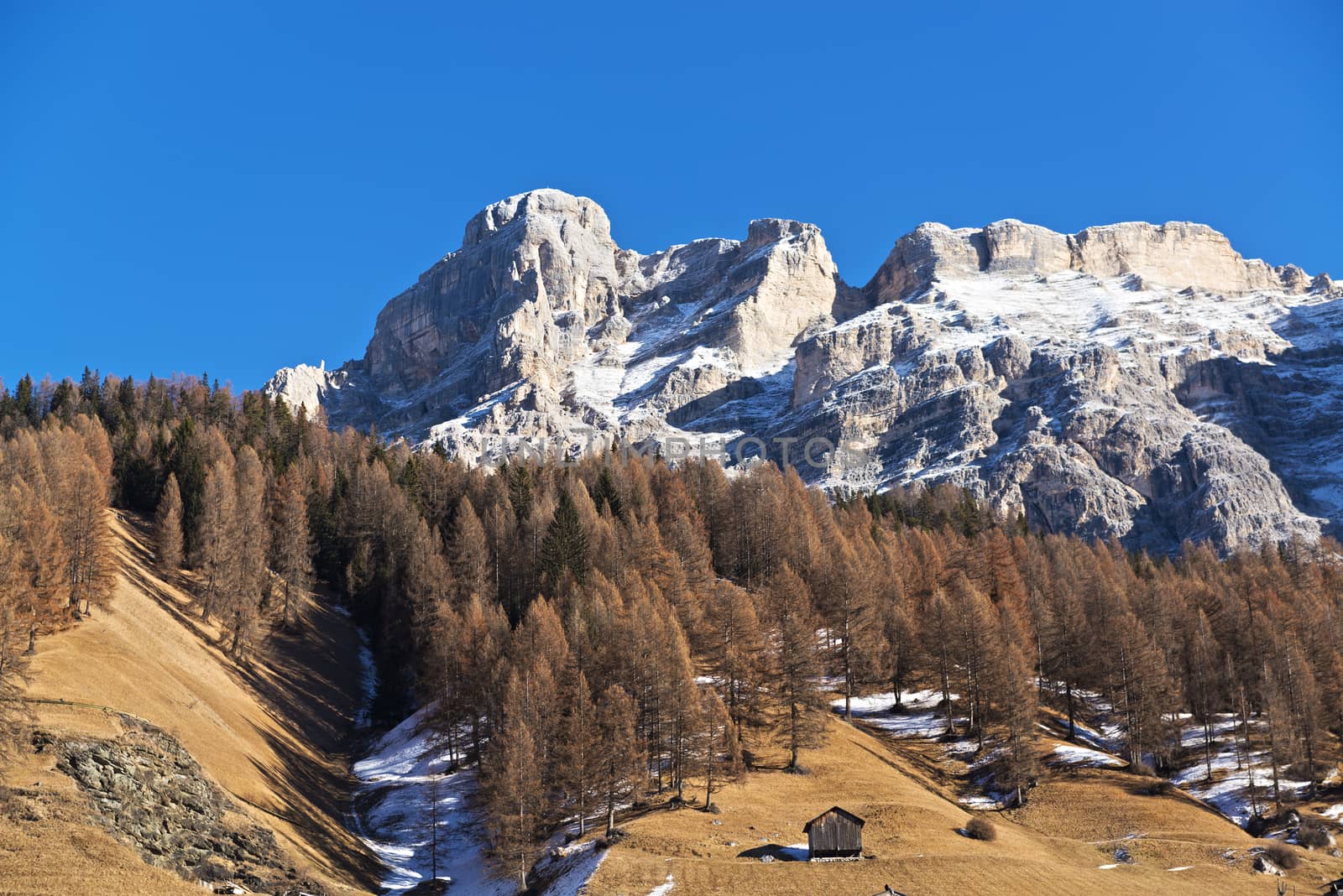 Mountains and hill landscape in autumn season with blue sky in background, Alta Badia - Dolomiti, Trentino-Alto Adige