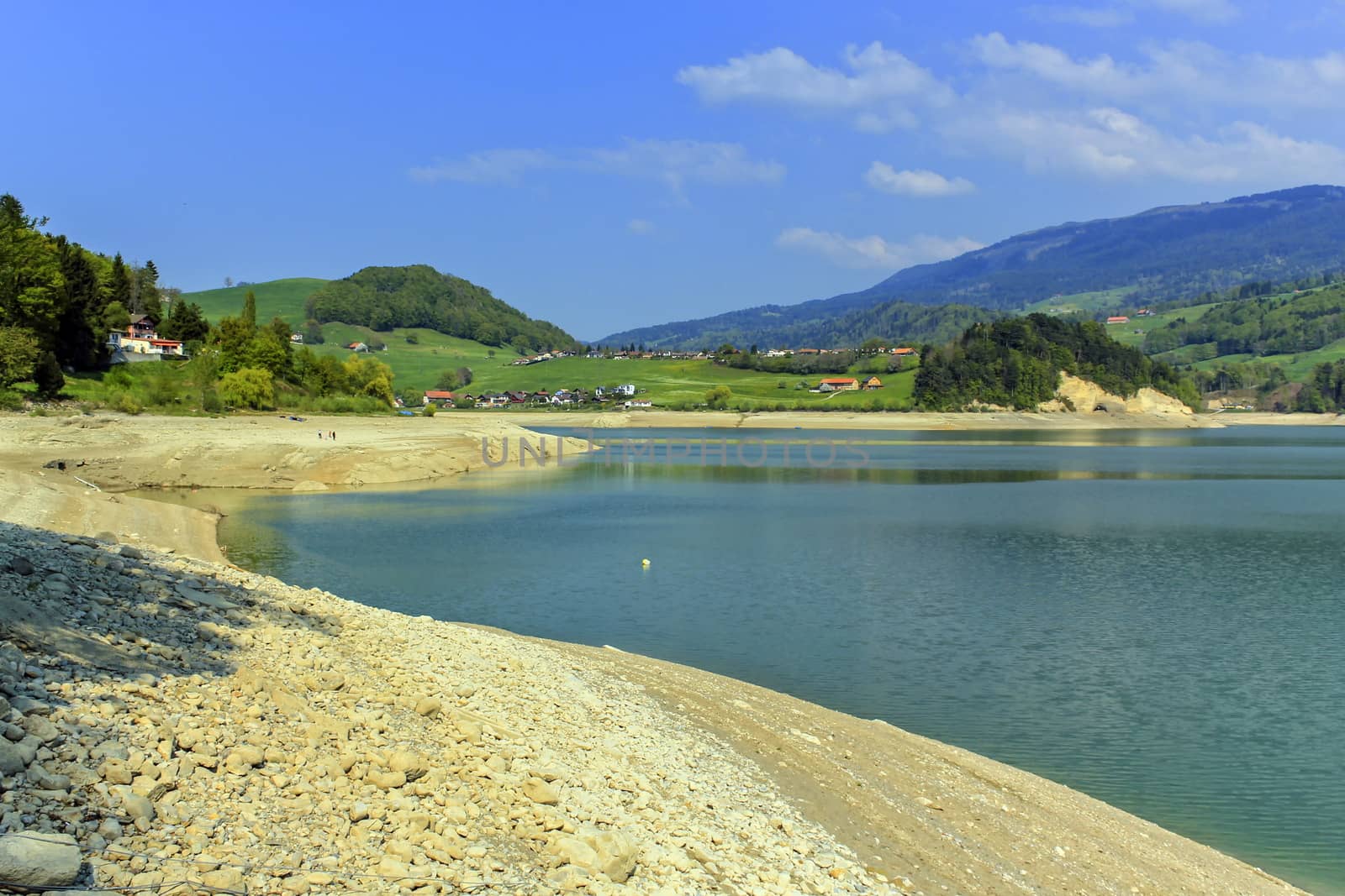 Dry Gruyeres lake in summer, Fribourg canton, Switzerland