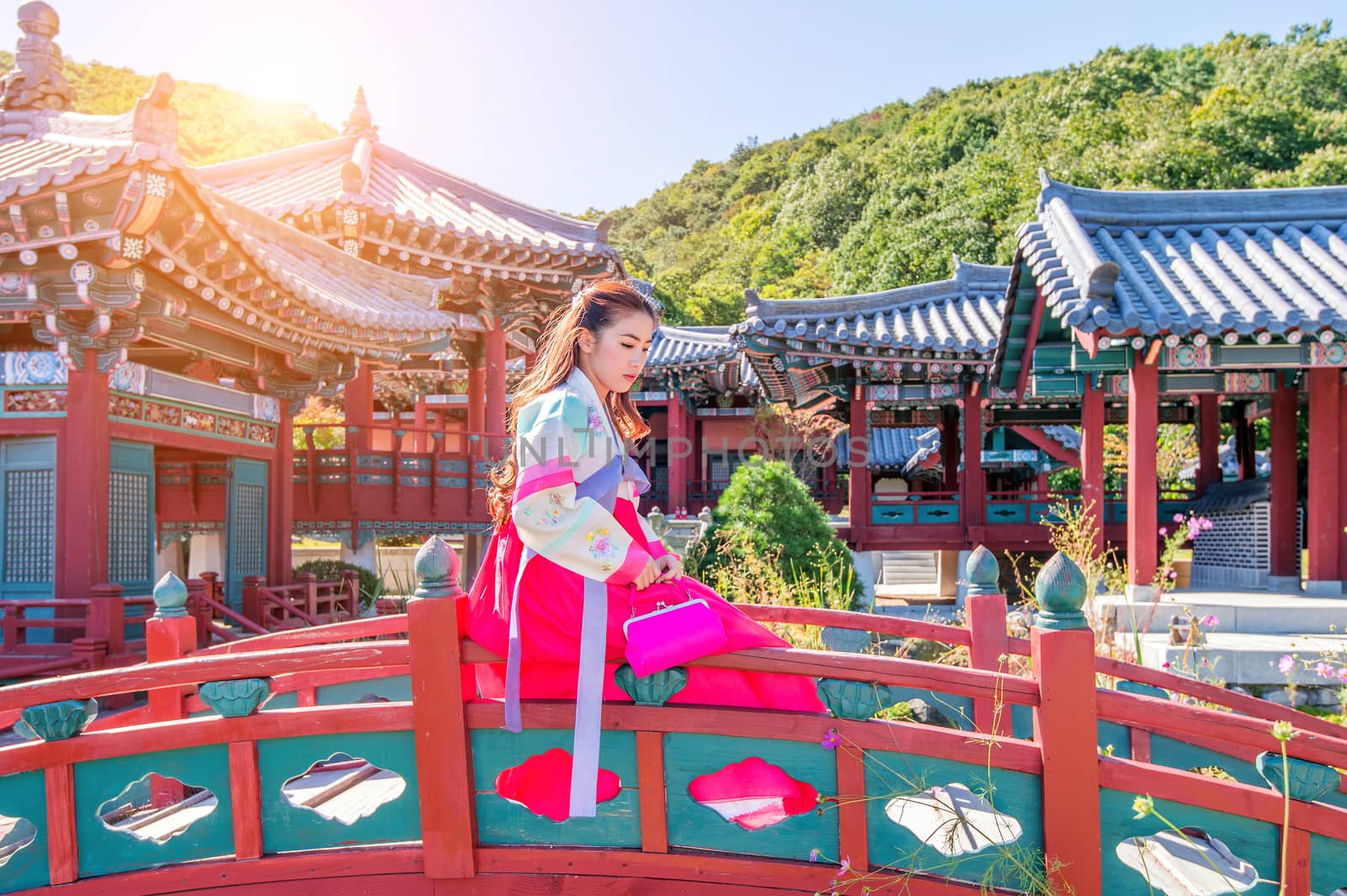 Woman with Hanbok in Gyeongbokgung,the traditional Korean dress. by gutarphotoghaphy