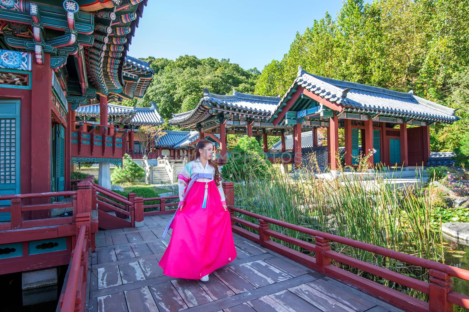 Woman with Hanbok in Gyeongbokgung,the traditional Korean dress. by gutarphotoghaphy
