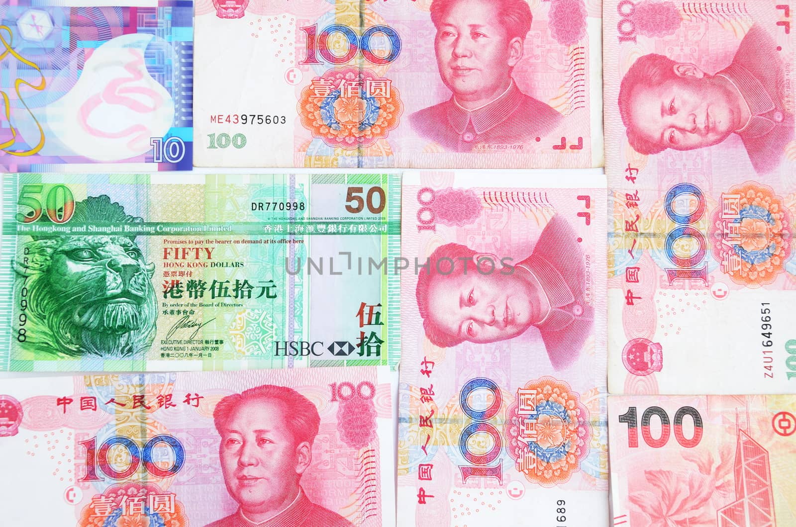 Chinese money Yuan and Hongkong dollars mixed together. Few different banknotes from Asia.