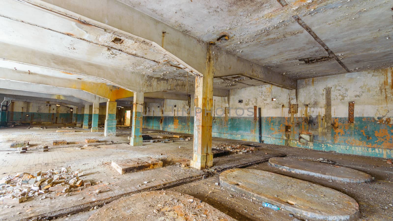 wide angle view of an old wall abandoned factory building