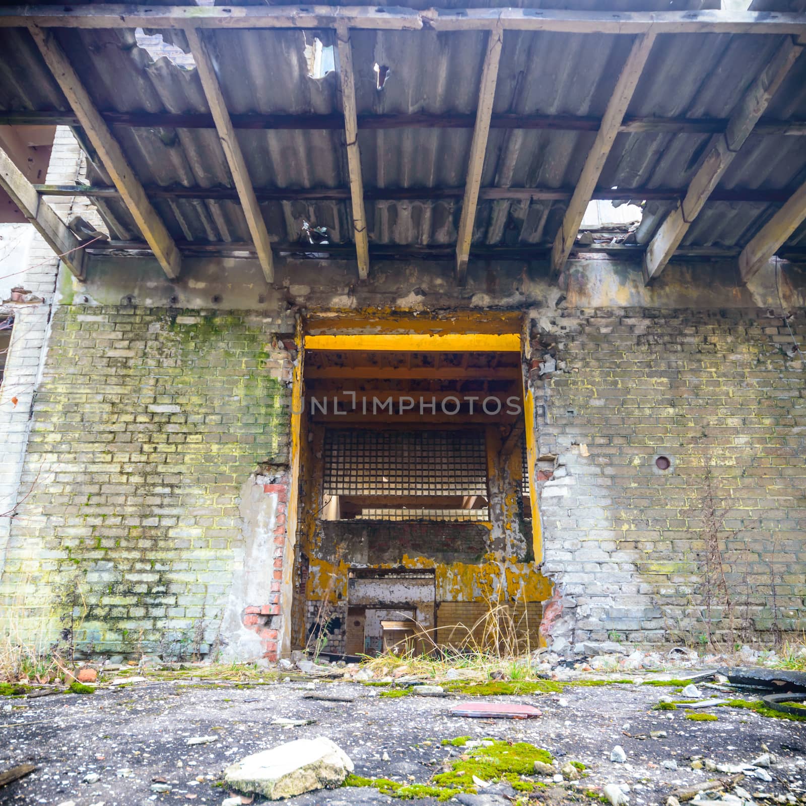 wide angle view of an old wall abandoned factory building