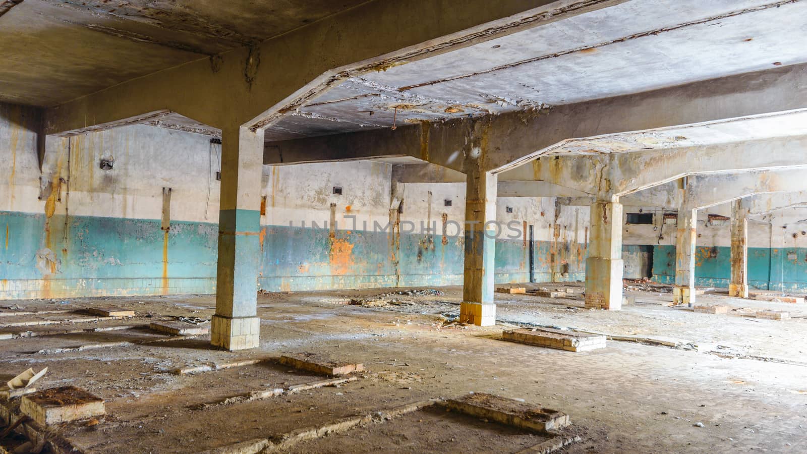 wide angle view of an old wall abandoned factory building