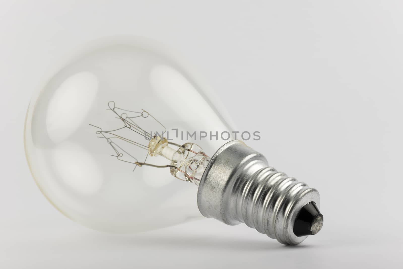 Old light bulb with artfully shaped filaments
