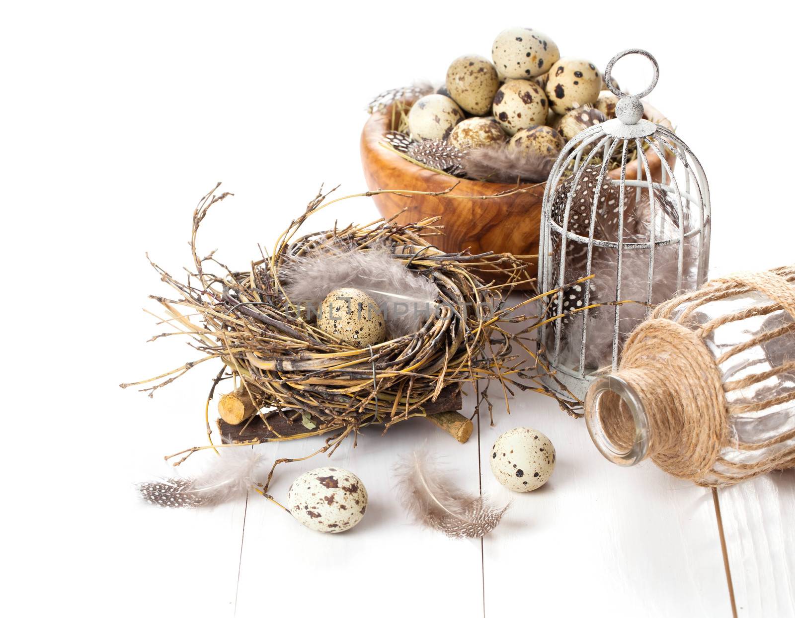 quail eggs on white wooden background