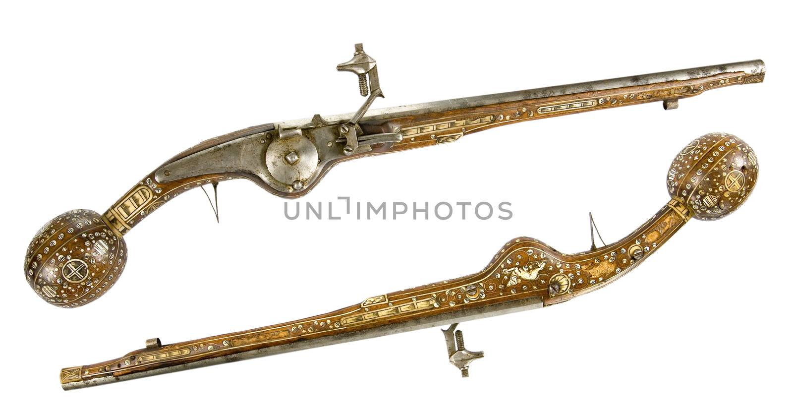 Old pistol inlaid with bone and enamel. Ceremonial weapon