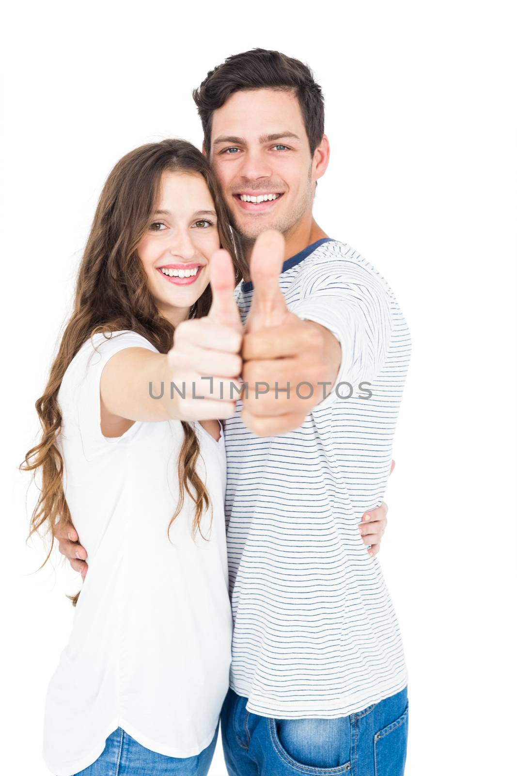 Couple with thumbs up on white background