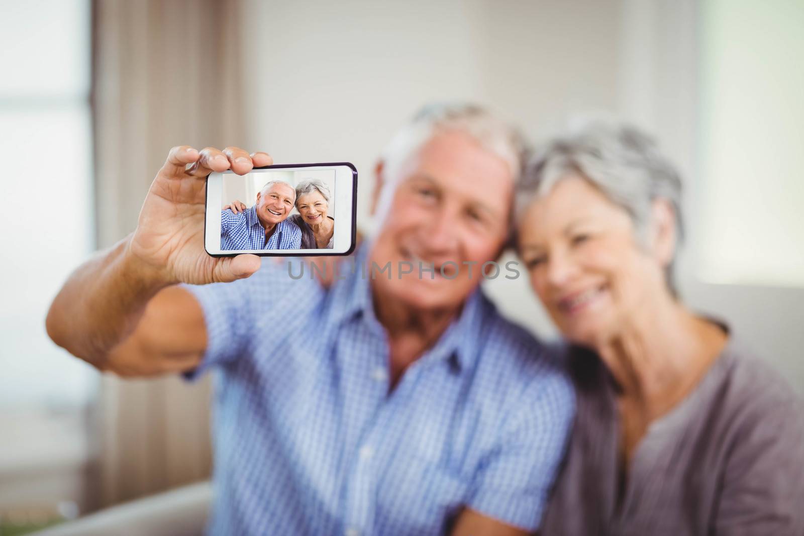 Senior couple taking a selfie by Wavebreakmedia