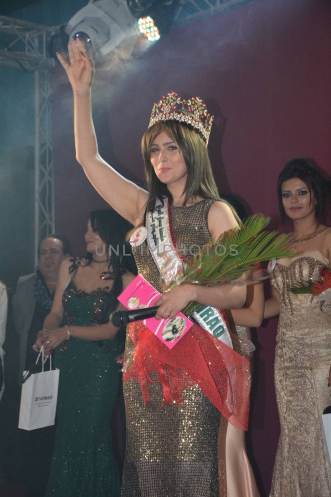 IRAQ, Baghdad: Shaymaa Abdelrahman is crowned Miss Iraq on December 18, 2015 in Baghdad. The 20-year-old, green-eyed knockout from Kirkuk is reportedly the first beauty queen to be chosen in Iraq since 1972. While Iraq is most often depicted as a contentious, war-torn area on the geopolitical landscape, this pageant is a means to show the world that many Iraqis still love life at home.