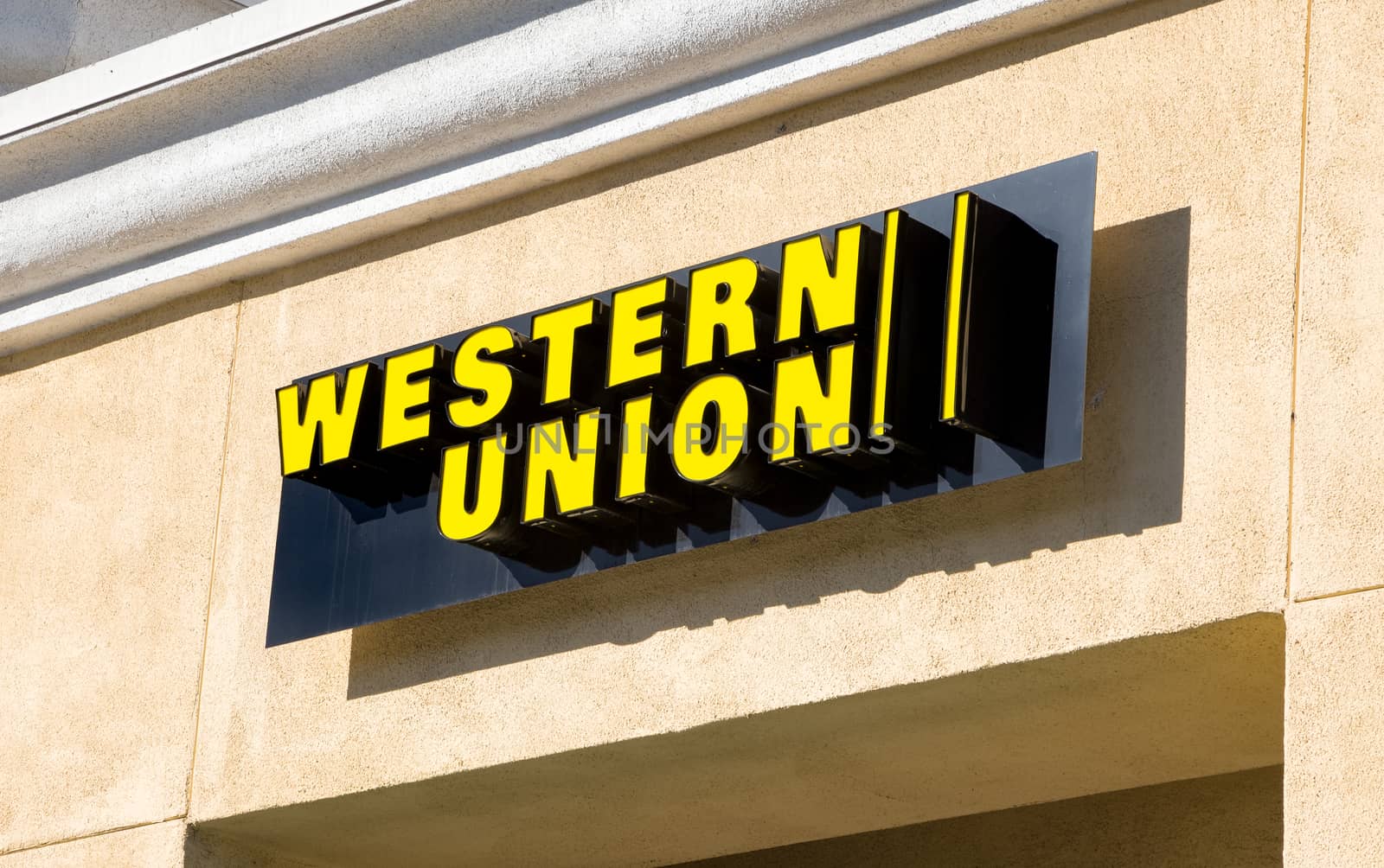 ARCADIA, CA/USA - NOVEMBER 22, 2015: Western Union sign and logo. The Western Union Company is an American financial services and communications company.