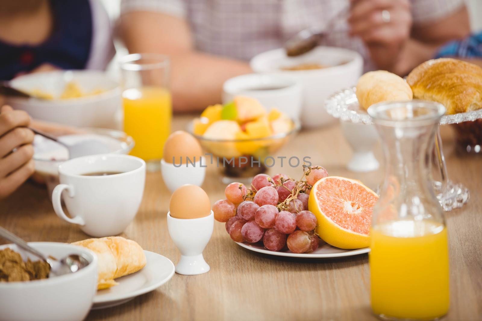 Family having breakfast together at home