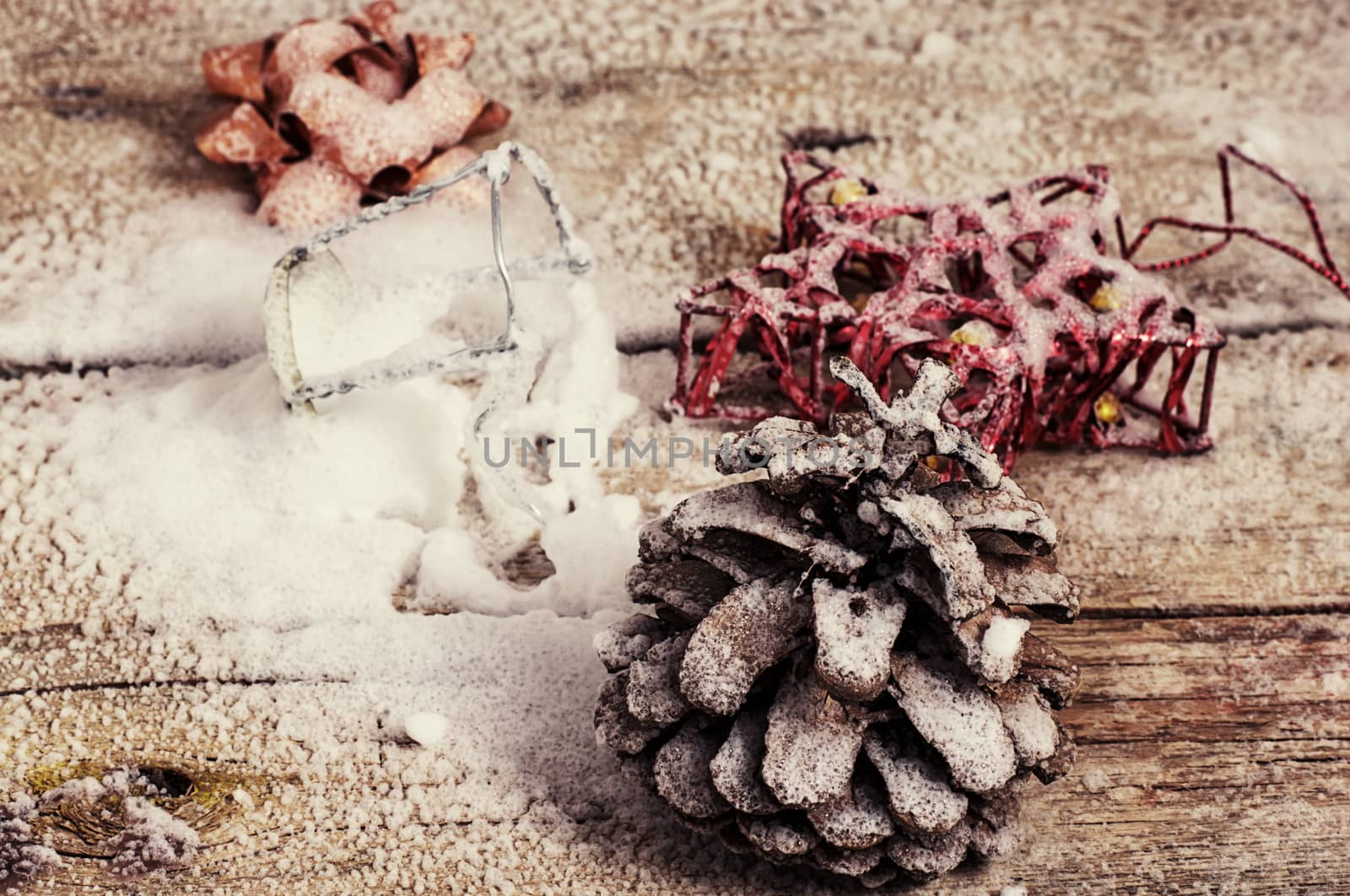 Christmas decorations and toys on wooden background