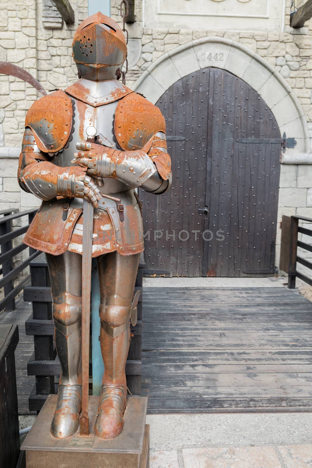 Medieval armor in front of a castle. by Isaac74