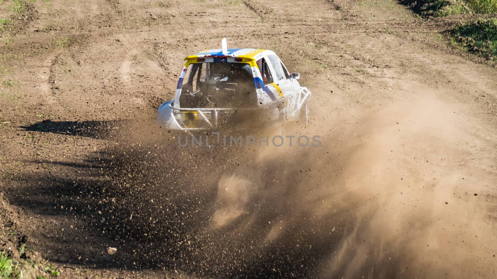 Car during a "stock car cross" race. The league called "stock car cross" foresees the use of tuned cars on unpaved circuits.