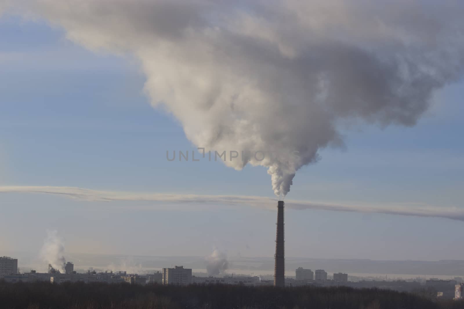 funnel in city smog, witer, blue sky