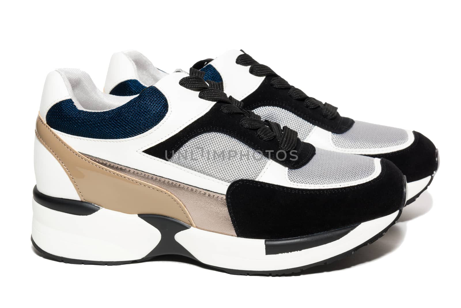 The photo shows the shoes on a white background