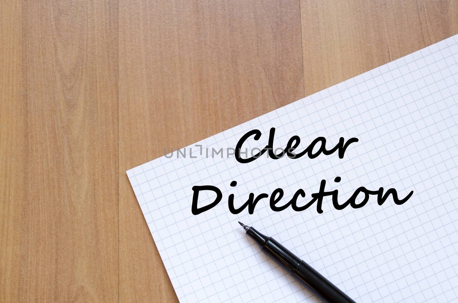 Clear direction text concept write on notebook with pen