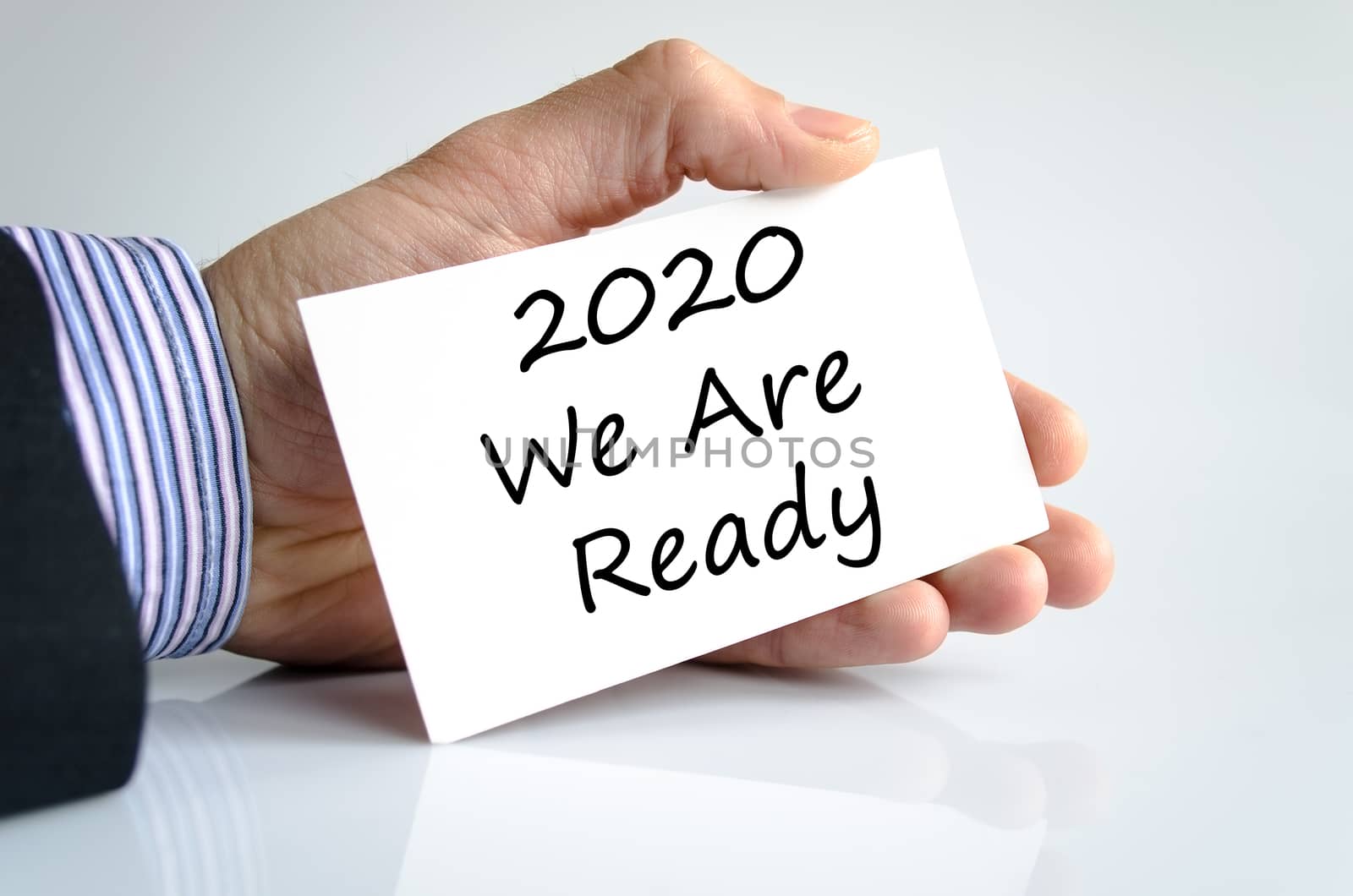 Business man hand writing 2020 we are ready