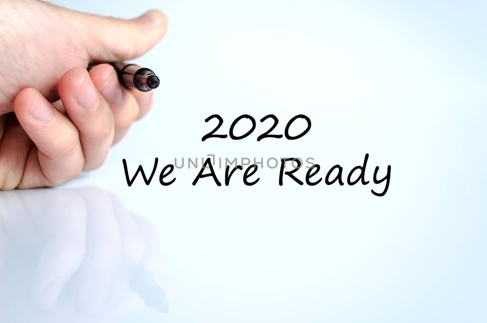 Business man hand writing 2020 we are ready
