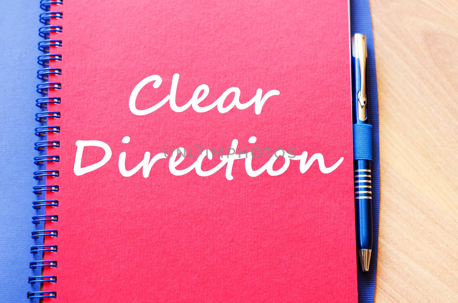 Clear direction text concept write on notebook with pen