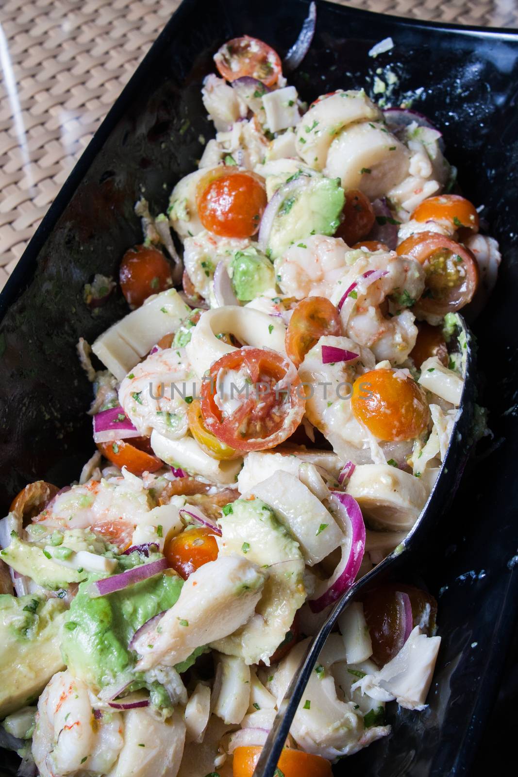 salad with fresh tomatoes cherry shrimps macaroni and lettuce