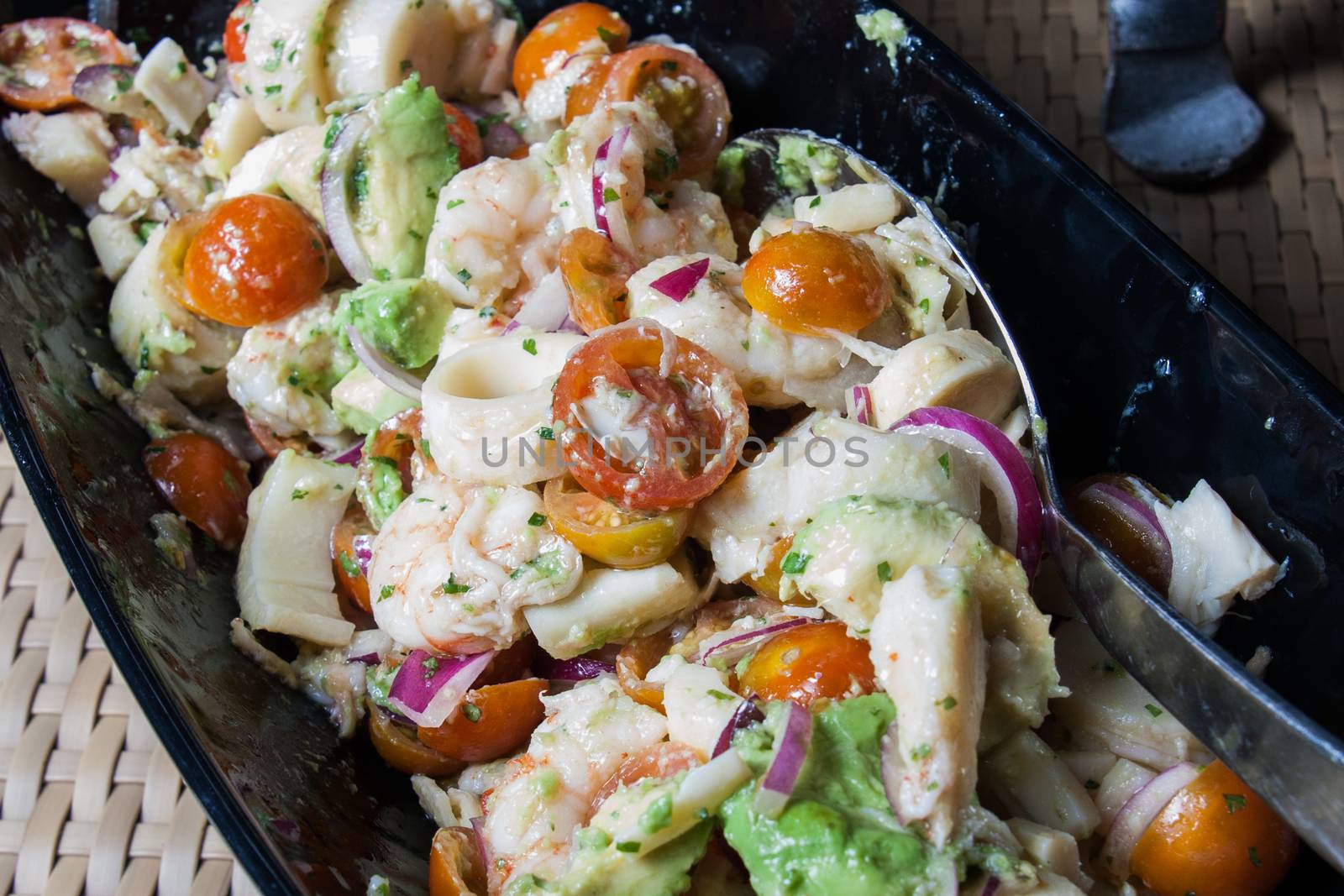 salad with fresh tomatoes cherry shrimps macaroni and lettuce