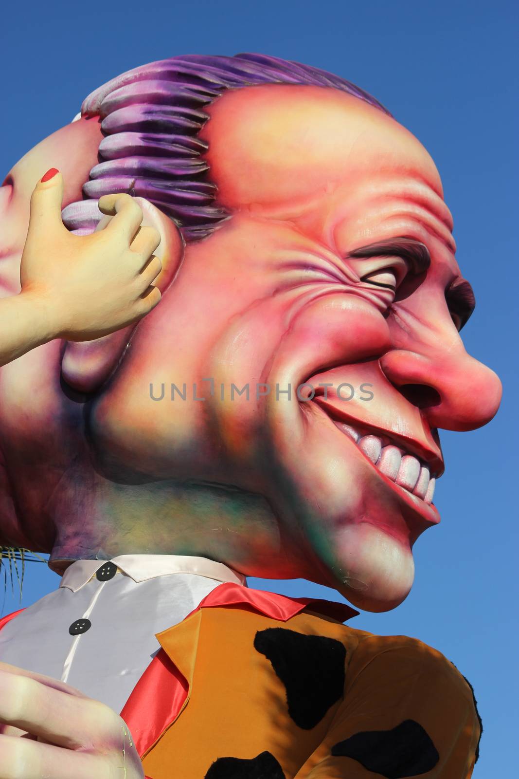 Nice, France - February 21 2016: Caricature of Silvio Berlusconi. Berlusconi is a Businessman and an Italian Politician. Parade Float during the Carnival of Nice (Corso Carnavalesque 2016) in French Riviera. The Theme for 2016 was King of Media