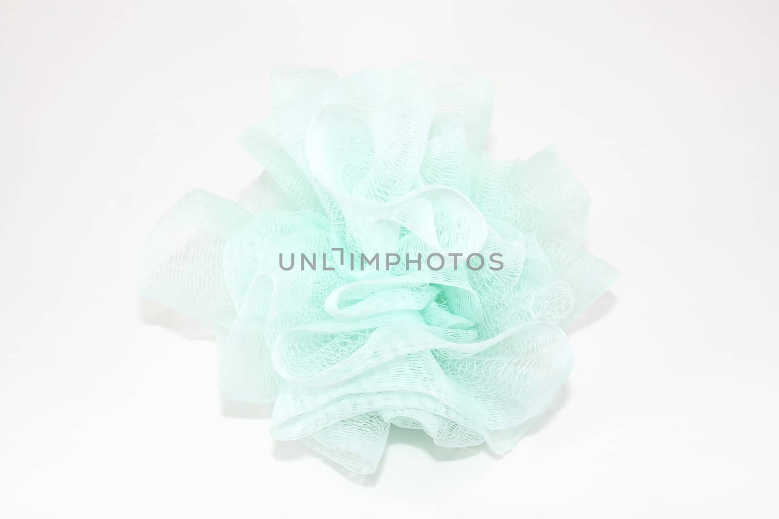 Soft Blue plastic bath puff isolated on white background by worrayuth