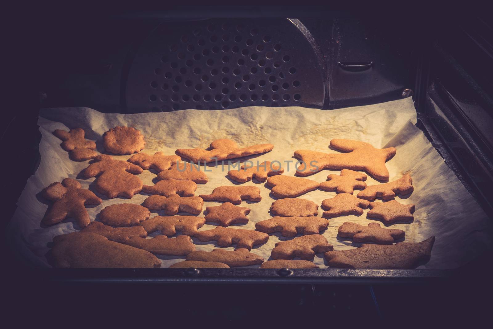 Xmas cookies in various shapes in the oven