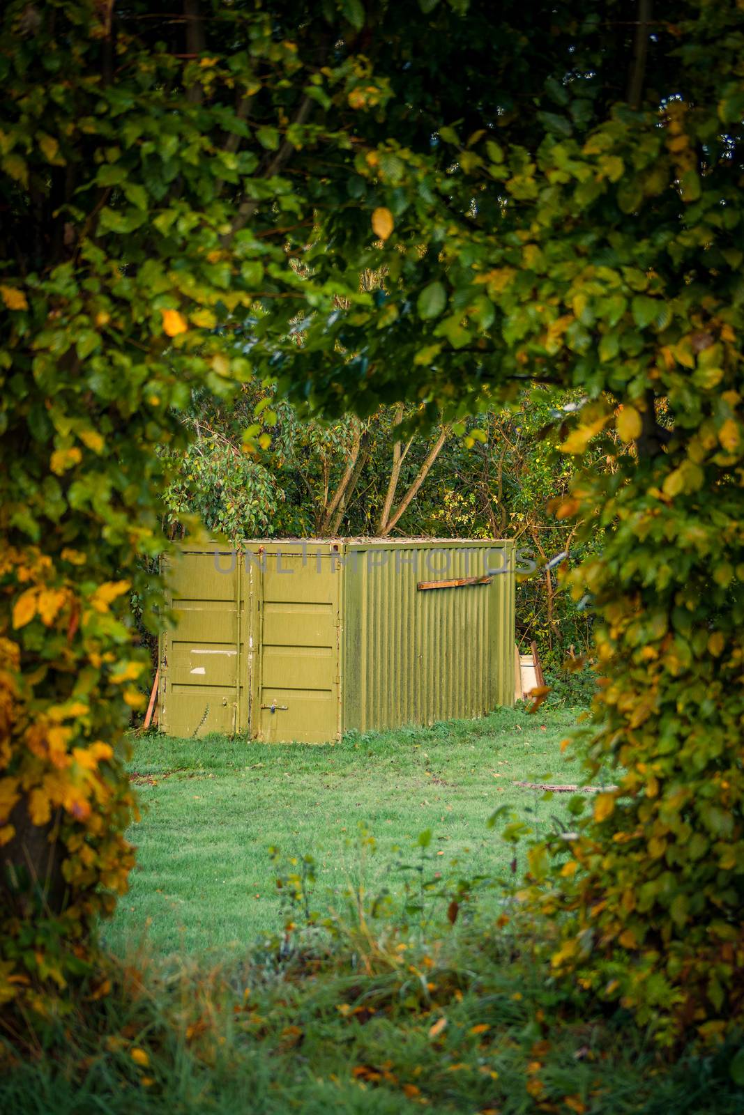 Storage container in the nature in autumn