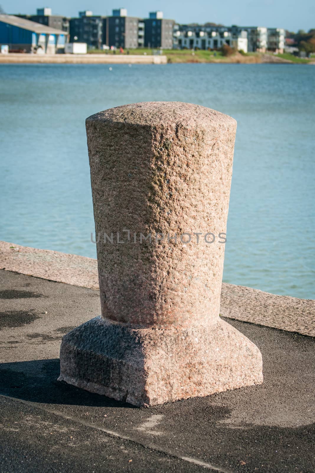 Dock post in stone at the harbor