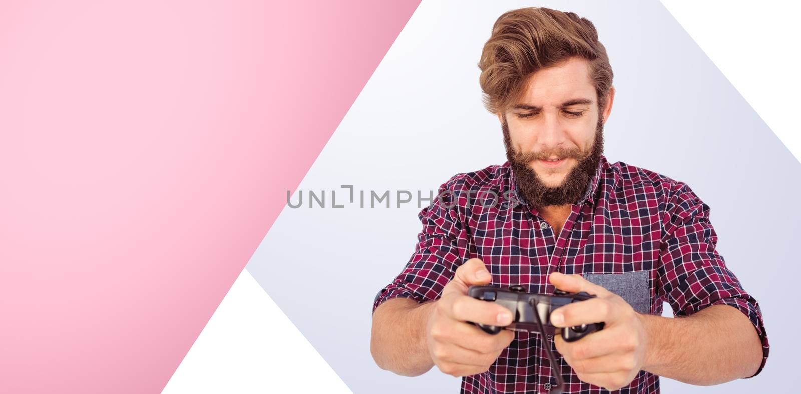 Hipster playing video game against pink background