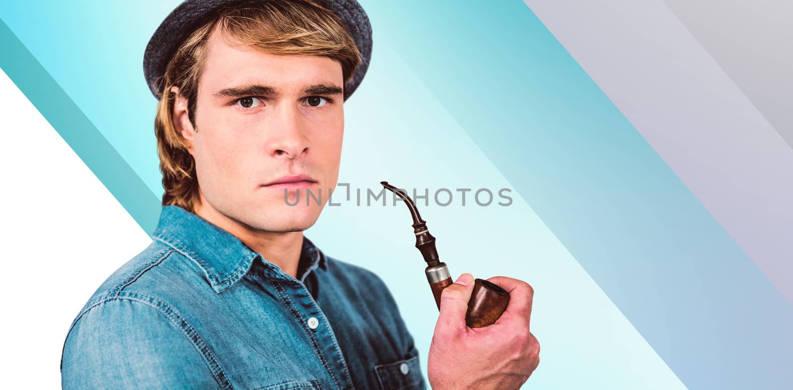 Serious hipster holding pipe against blue vignette background