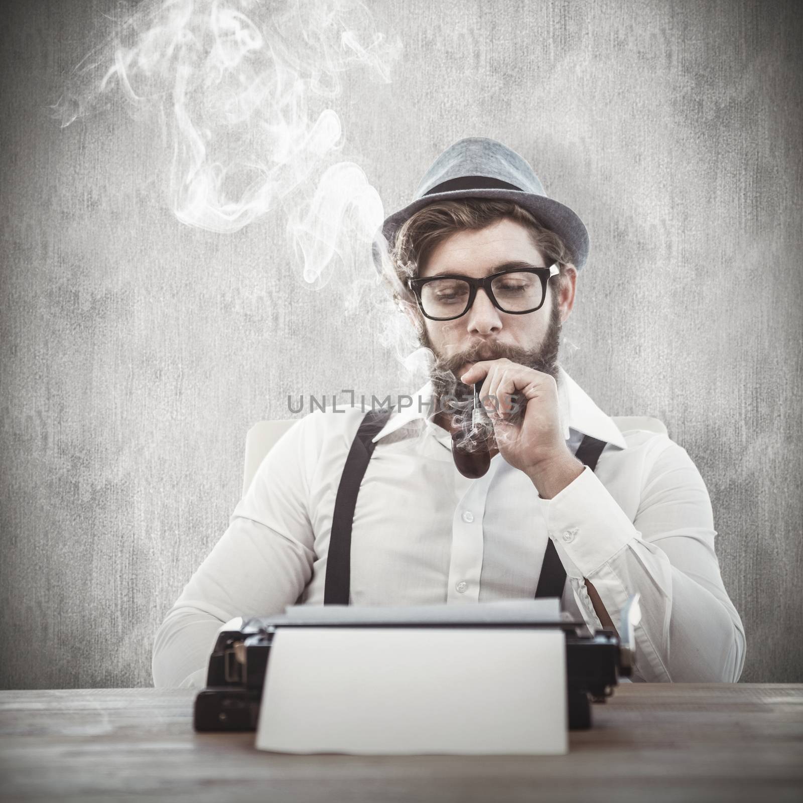 Composite image of hipster smoking pipe while sitting looking at typewriter by Wavebreakmedia