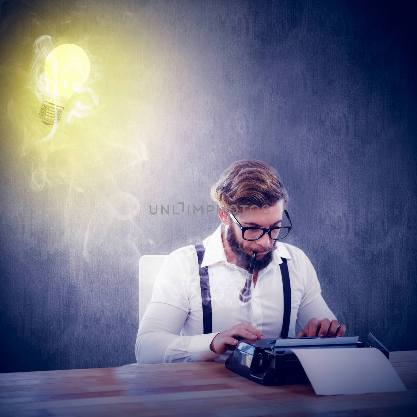 Hipster smoking pipe while working on typewriter against white and grey background
