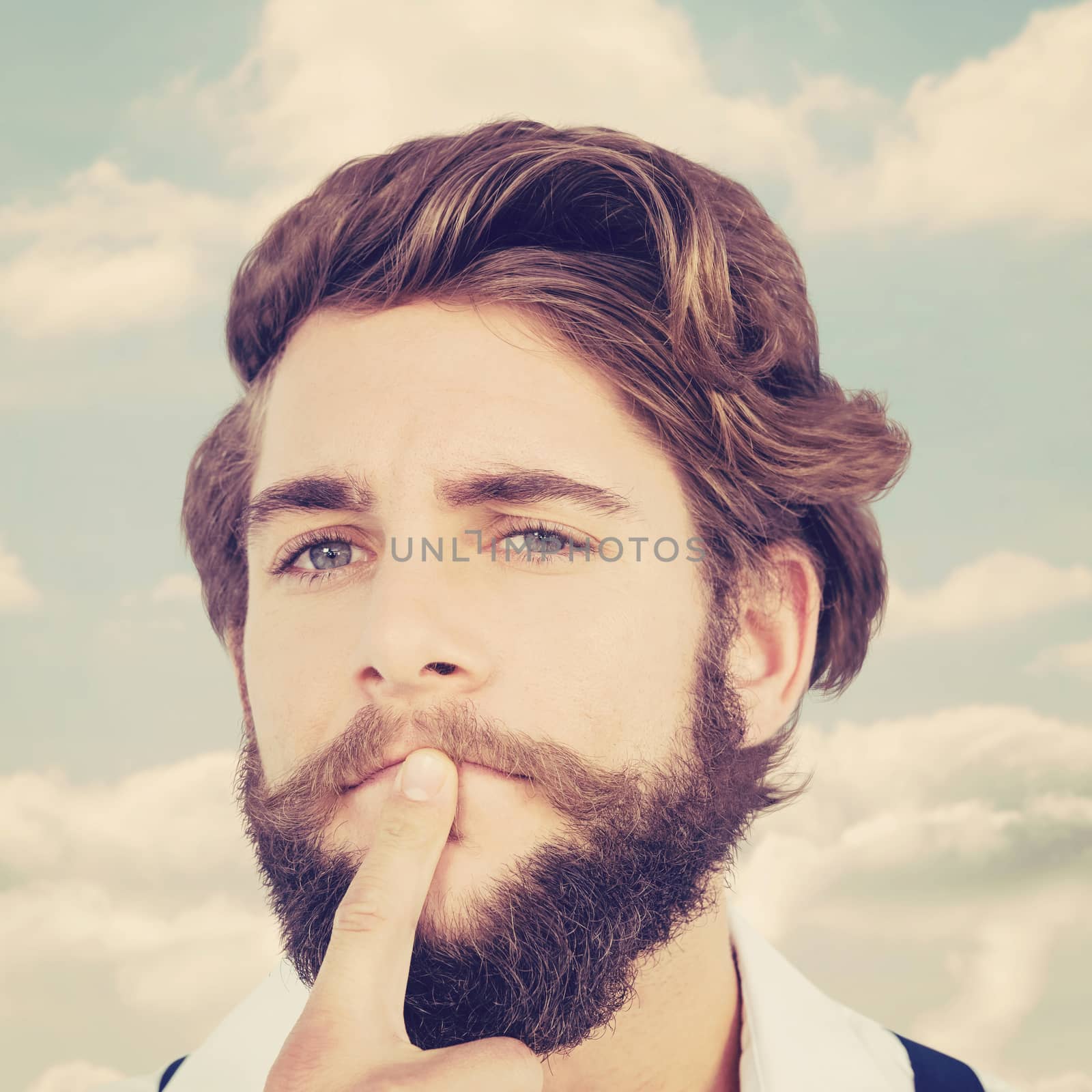 Composite image of portrait of hipster with finger on chin by Wavebreakmedia