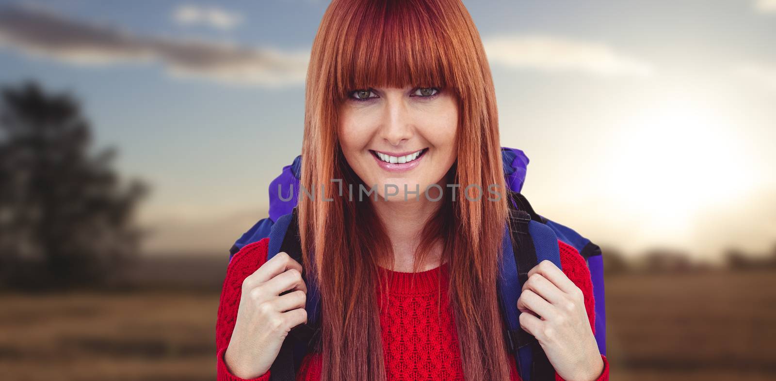 Composite image of smiling hipster woman with a travel bag taking selfie by Wavebreakmedia