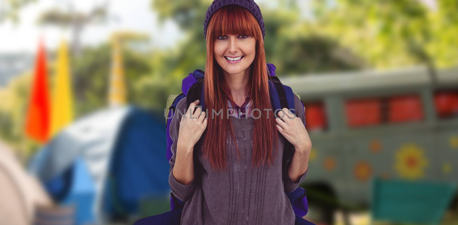 Composite image of smiling hipster woman with a travel bag by Wavebreakmedia