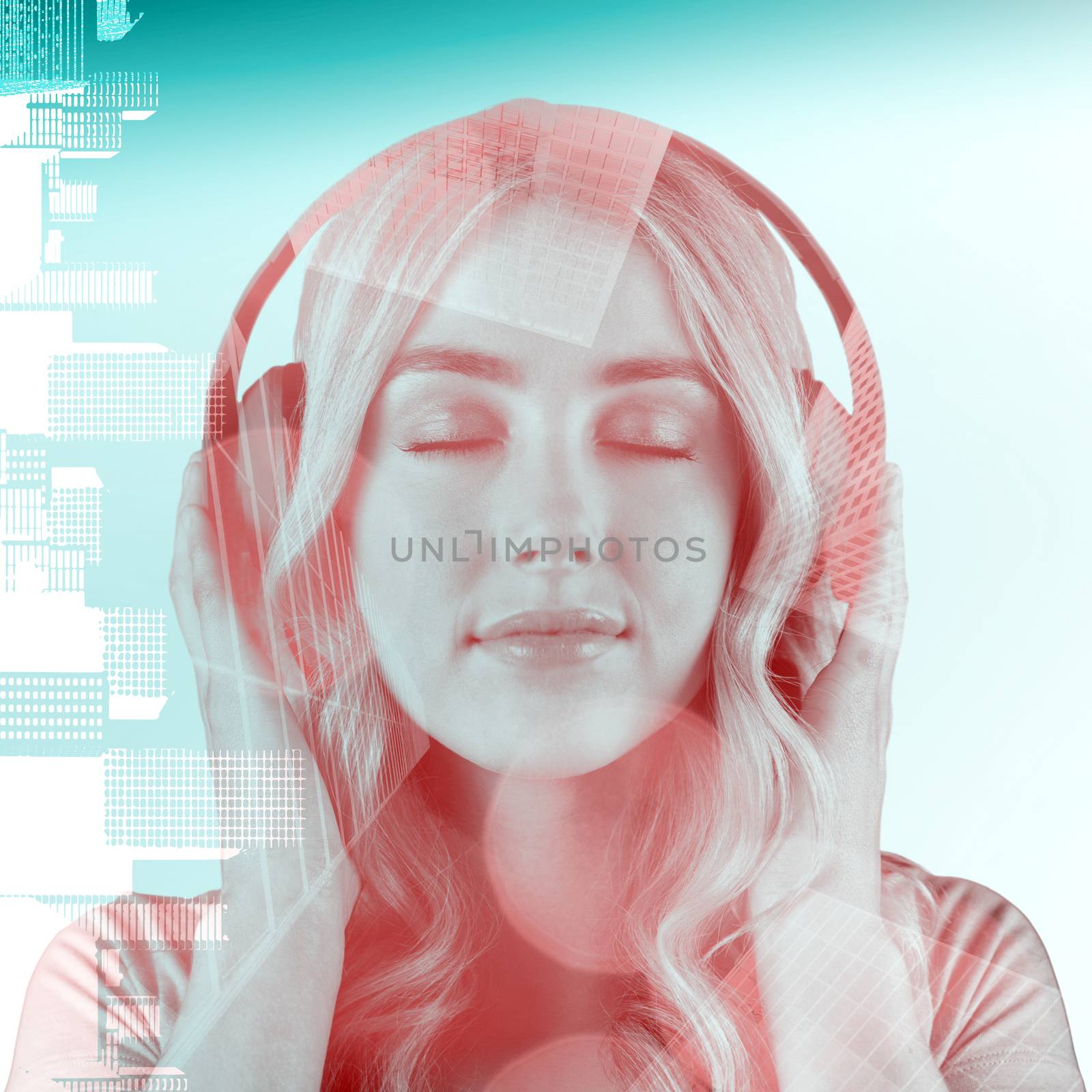 Close up of a woman listening to music  against skyscraper
