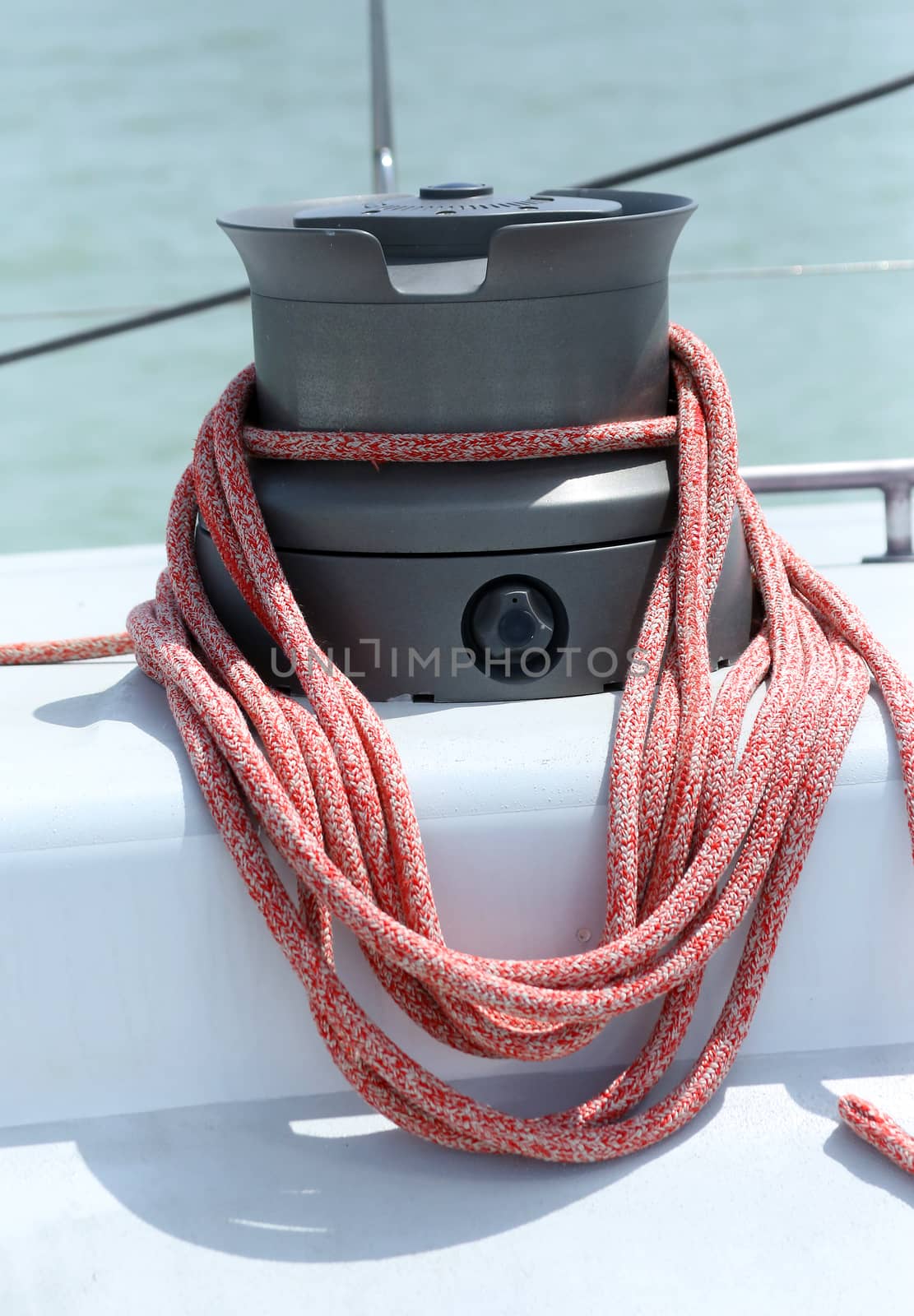 Winch sheet with rope on a sailing yacht by sergasx