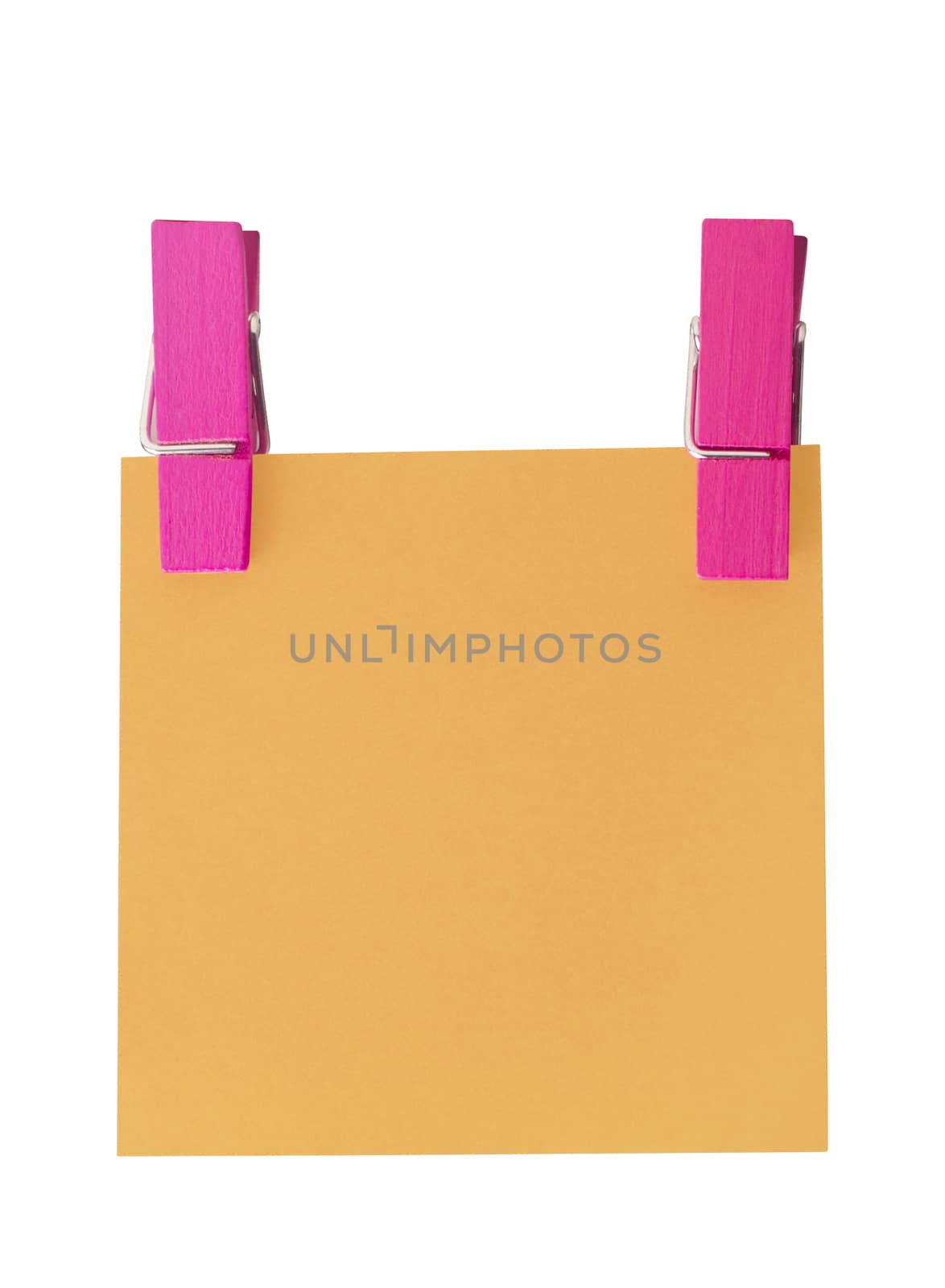 Orange paper note held by two pegs on white background