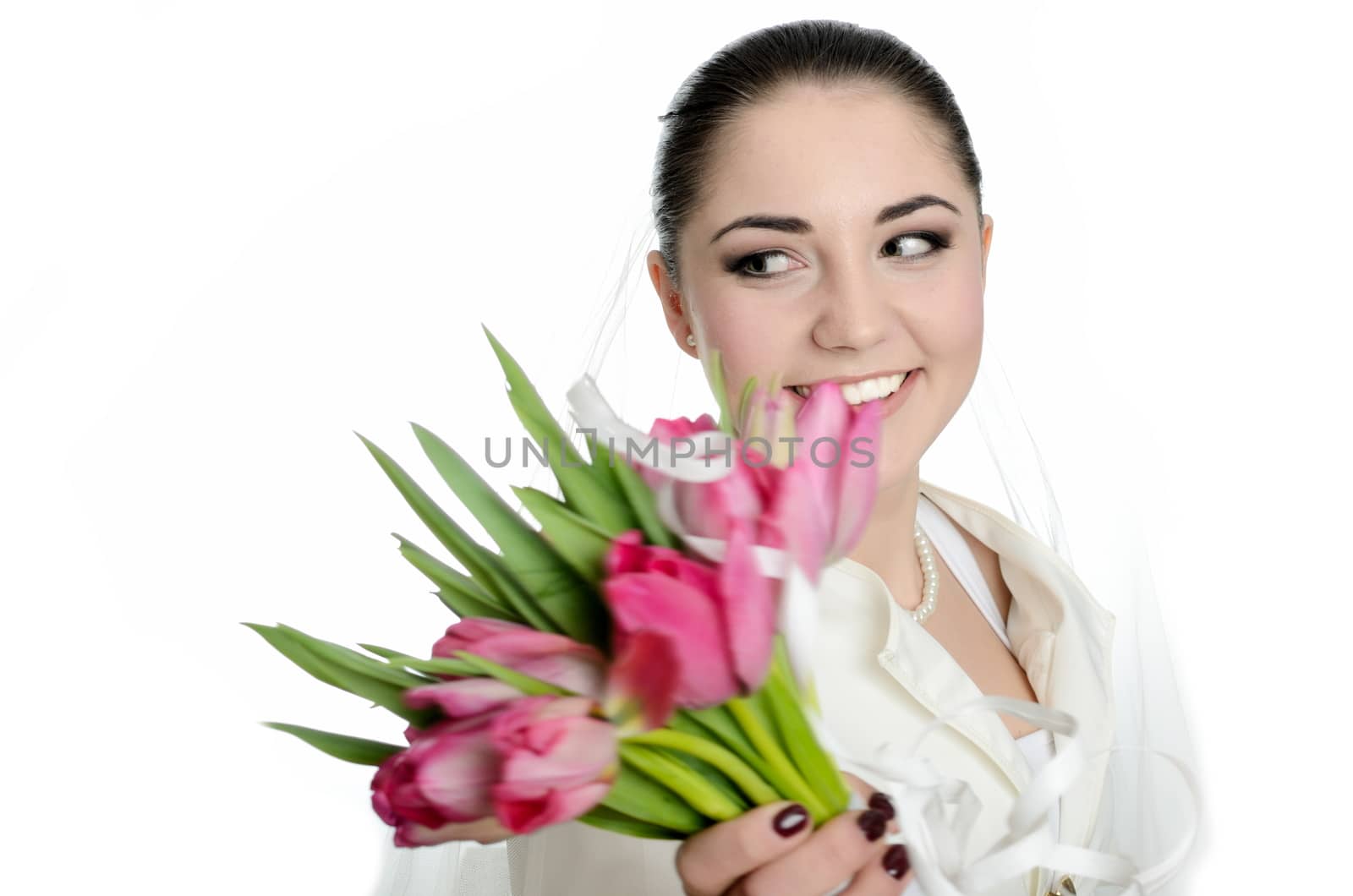 Smiling bride throwing bouquet by bartekchiny