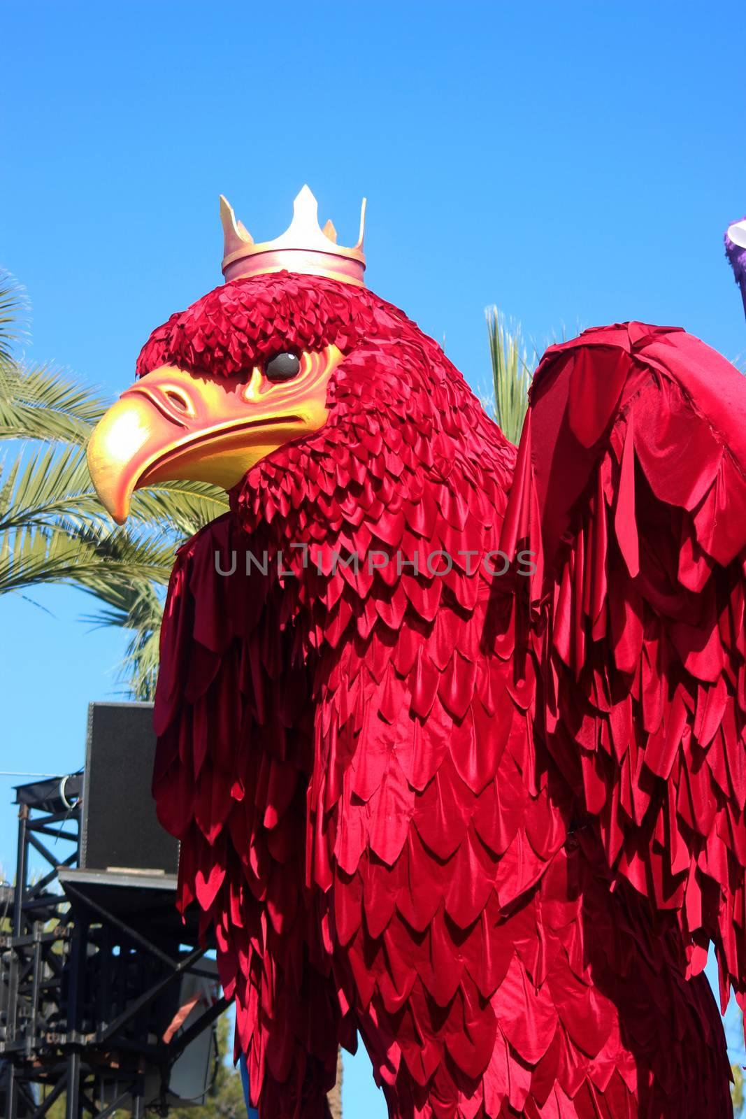 Nice, France - February 21 2016: King Red Eagle Phoenix (mythology). Parade Float during the Carnival of Nice (Corso Carnavalesque 2016) in French Riviera. The Theme for 2016 was King of Media