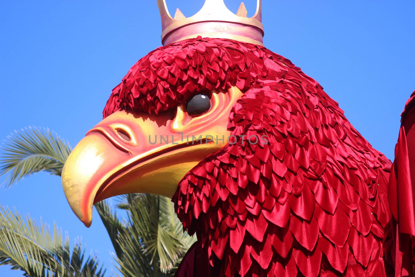 Nice, France - February 21 2016: King Red Eagle Phoenix (mythology). Parade Float during the Carnival of Nice (Corso Carnavalesque 2016) in French Riviera. The Theme for 2016 was King of Media