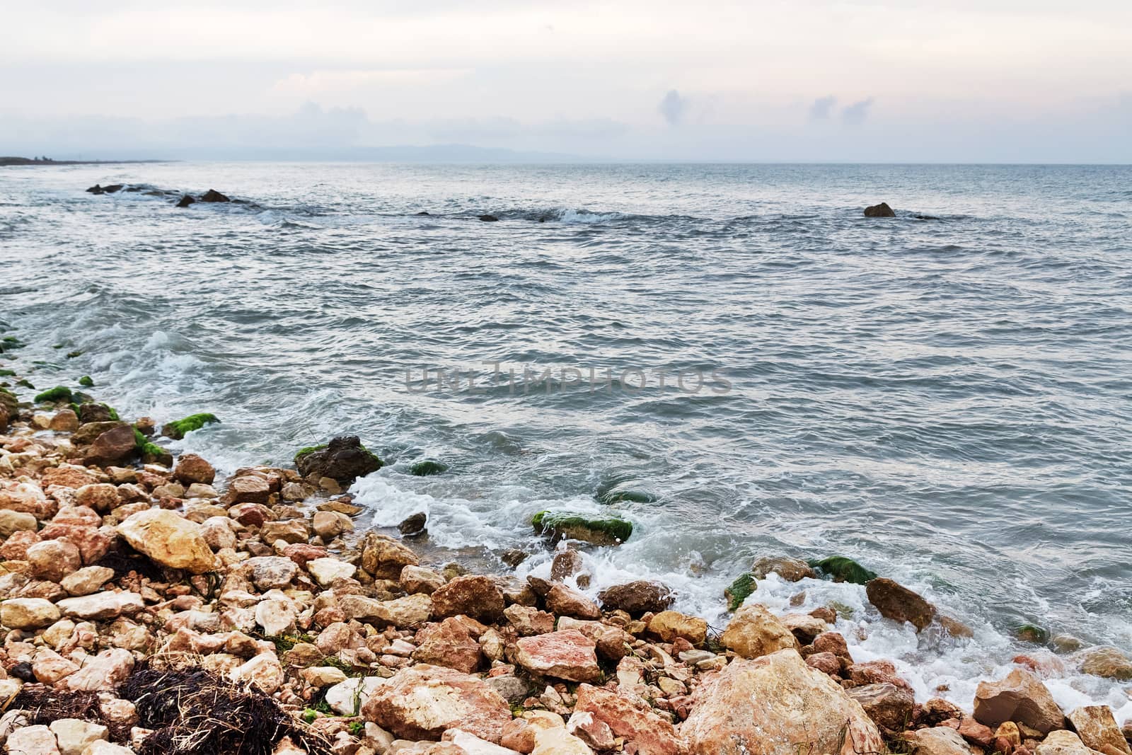 Rocky coast and stormy sea in Catalonia by anikasalsera